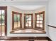 Built-in window seat with views of backyard and deck at 32 Peeksville Rd, Locust Grove, GA 30248