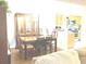 Bright dining room features a table with six chairs and a china cabinet at 6390 Arbor Ln, Morrow, GA 30260