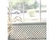 Screened porch with leafy green view and seating at 6390 Arbor Ln, Morrow, GA 30260