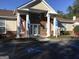 Brick building exterior with American flag and accessible entrance at 175 Camry Ln, Grayson, GA 30017