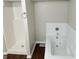 Bathroom with a shower and a jetted tub, offering modern convenience at 628 Bexton Rd, Moreland, GA 30259