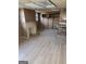 Unfinished basement with wood paneling and fireplace at 1521 Green Valley Ct, Conley, GA 30288