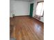 Bright living room featuring hardwood floors at 1521 Green Valley Ct, Conley, GA 30288