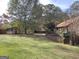View of the backyard, shed, and deck at 2021 Brook Valley Ct, Jonesboro, GA 30236