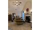 Living Room with fireplace, ceiling fan, and carpeted floors at 116 Winthrop Dr, Sharpsburg, GA 30277