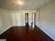 Spacious bedroom with hardwood floors and double closets at 1529 Evergreen Hollow Ln, Conyers, GA 30012