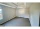 Bright bedroom featuring carpeted floor and neutral walls at 1529 Evergreen Hollow Ln, Conyers, GA 30012