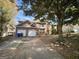 Brick house with two-car garage and landscaping at 1529 Evergreen Hollow Ln, Conyers, GA 30012