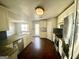 Modern kitchen with granite countertops and stainless steel appliances at 1529 Evergreen Hollow Ln, Conyers, GA 30012