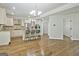 Modern kitchen with island and stainless steel appliances at 170 Castlewood Rd, Tyrone, GA 30290