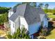 White two-story house with a gray roof and deck at 1285 E Hwy 5, Carrollton, GA 30116