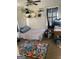 Small bedroom with a twin bed and wood desk at 8965 Campbellton St, Douglasville, GA 30134
