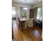 Dining room with hardwood floors and wood table at 8965 Campbellton St, Douglasville, GA 30134