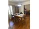 Dining room with hardwood floors and wood table at 8965 Campbellton St, Douglasville, GA 30134