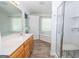 Large bathroom with double vanity, shower, and jacuzzi tub at 611 Bernhard Rd, Fayetteville, GA 30215