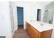 Bathroom with double vanity, shower, and walk-in closet at 611 Bernhard Rd, Fayetteville, GA 30215