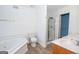 Bathroom boasts a garden tub, shower, and double vanity at 611 Bernhard Rd, Fayetteville, GA 30215