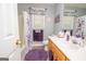 Clean bathroom with tub, shower, and updated vanity at 611 Bernhard Rd, Fayetteville, GA 30215