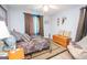 Spacious bedroom with ample closet space and ceiling fan at 611 Bernhard Rd, Fayetteville, GA 30215