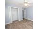 Bedroom with walk-in closet and ceiling fan at 611 Bernhard Rd, Fayetteville, GA 30215