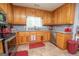 Kitchen boasts oak cabinets and granite countertops at 611 Bernhard Rd, Fayetteville, GA 30215