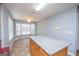 Kitchen island with granite countertops and breakfast nook at 611 Bernhard Rd, Fayetteville, GA 30215