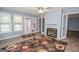 Living room with fireplace and access to other rooms at 611 Bernhard Rd, Fayetteville, GA 30215
