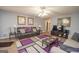 Spacious living room with hardwood floors, fireplace and large windows at 611 Bernhard Rd, Fayetteville, GA 30215