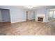 Spacious living room with hardwood floors and fireplace at 611 Bernhard Rd, Fayetteville, GA 30215