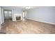 Spacious living room featuring a fireplace and hardwood floors at 611 Bernhard Rd, Fayetteville, GA 30215