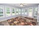 Sunroom with multiple windows and access to deck at 611 Bernhard Rd, Fayetteville, GA 30215