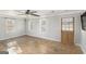 Bright living room featuring hardwood floors and multiple windows at 1659 Villa Rica Hwy, Dallas, GA 30157