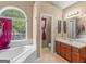 Main bathroom features a garden tub and separate shower at 2169 Parador Bnd, Mcdonough, GA 30253