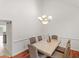 Dining room with chandelier and hardwood floors at 2110 Mcgarity Rd, Mcdonough, GA 30252