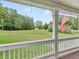 Porch overlooking backyard with wooded area at 2110 Mcgarity Rd, Mcdonough, GA 30252