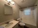 Clean bathroom with updated vanity, bathtub, and shower at 2658 Rollingwood Se Ln, Atlanta, GA 30316