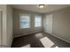 Bright bedroom with carpeted floors and large windows at 2658 Rollingwood Se Ln, Atlanta, GA 30316