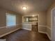 Bright dining area with hardwood floors and kitchen views at 2658 Rollingwood Se Ln, Atlanta, GA 30316