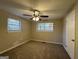 Bright bedroom with new carpet and large windows at 4906 Springbrook Dr, Douglasville, GA 30135