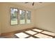 Spacious bedroom with hardwood floors and large windows at 2178 Bear Creek Rd, Moreland, GA 30259