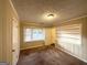 Spacious bedroom with built-in shelving and window at 1737 Mckenzie Dr, Decatur, GA 30032