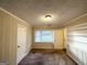 Bright bedroom with carpet flooring, window blinds, and ceiling fan at 1737 Mckenzie Dr, Decatur, GA 30032