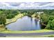 Aerial view of a peaceful lakefront community at 12021 Scottish Ct, Fayetteville, GA 30215