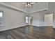 Bright bedroom with hardwood floors and access to en-suite bathroom at 12021 Scottish Ct, Fayetteville, GA 30215