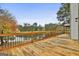 Spacious deck overlooking a tranquil lake, perfect for outdoor entertaining at 12021 Scottish Ct, Fayetteville, GA 30215