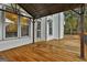 Deck with covered patio and access to backyard at 12021 Scottish Ct, Fayetteville, GA 30215