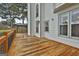 Deck with lake view and wooden railing at 12021 Scottish Ct, Fayetteville, GA 30215