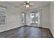 Spacious dining room with hardwood floors and lake views at 12021 Scottish Ct, Fayetteville, GA 30215