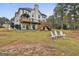 Two-story home with a large deck and lake view at 12021 Scottish Ct, Fayetteville, GA 30215