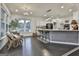 Spacious kitchen with island, stainless steel appliances, and white cabinets at 12021 Scottish Ct, Fayetteville, GA 30215